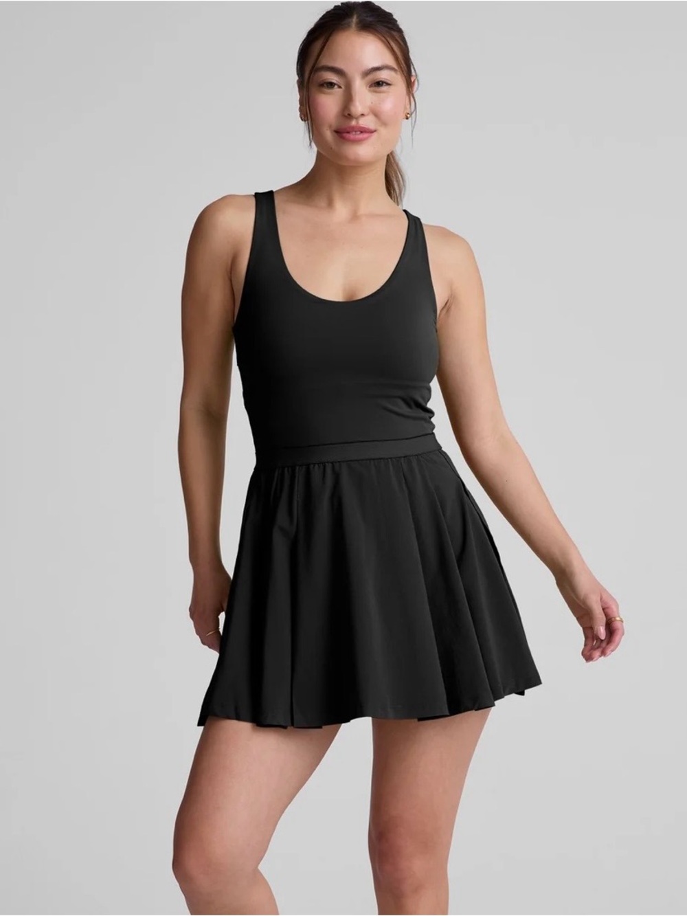 Beyond Yoga Black Score Dress. Pleated skirt, cutout back.